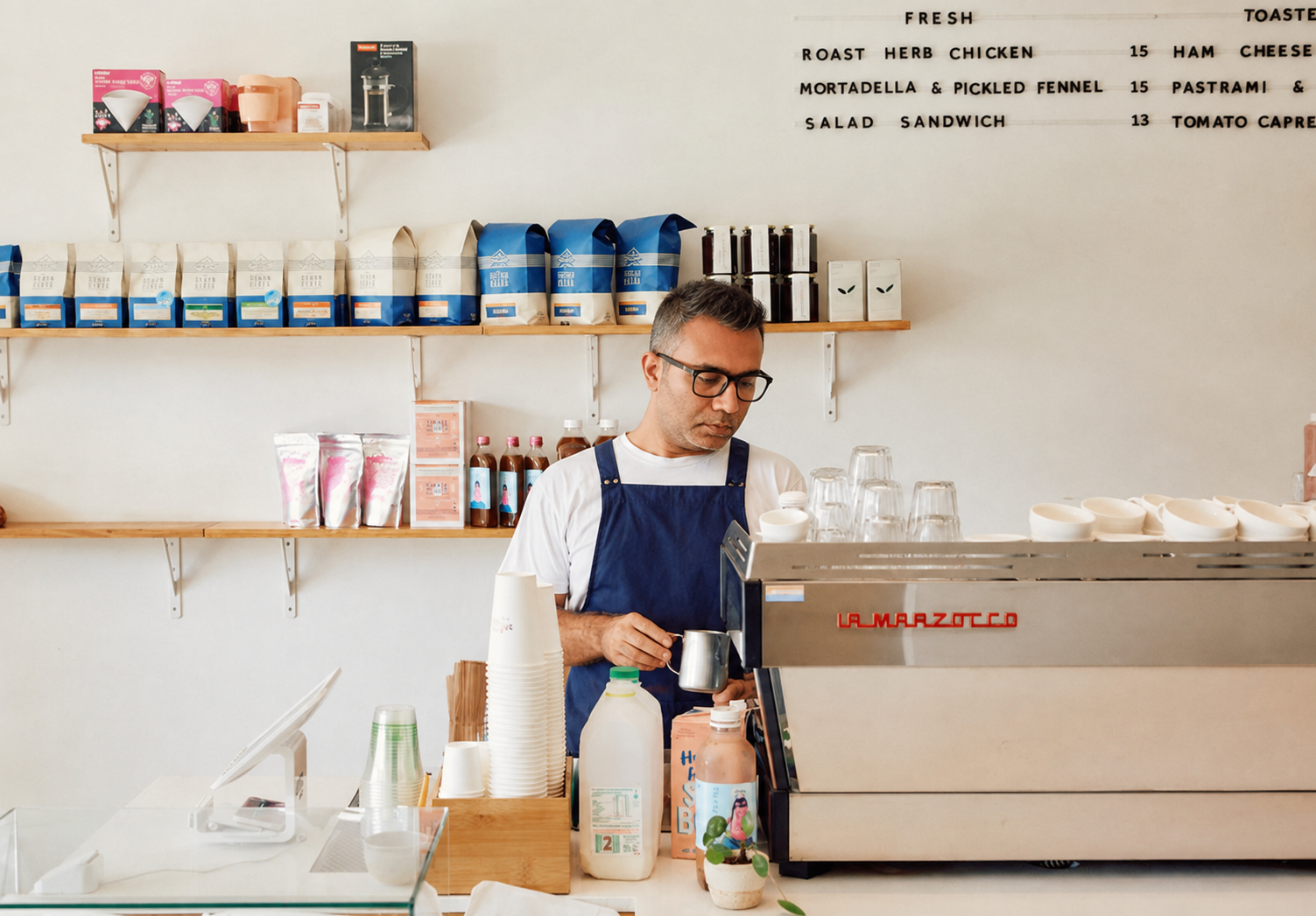 SIP founder working behind an Australian-style coffee bar